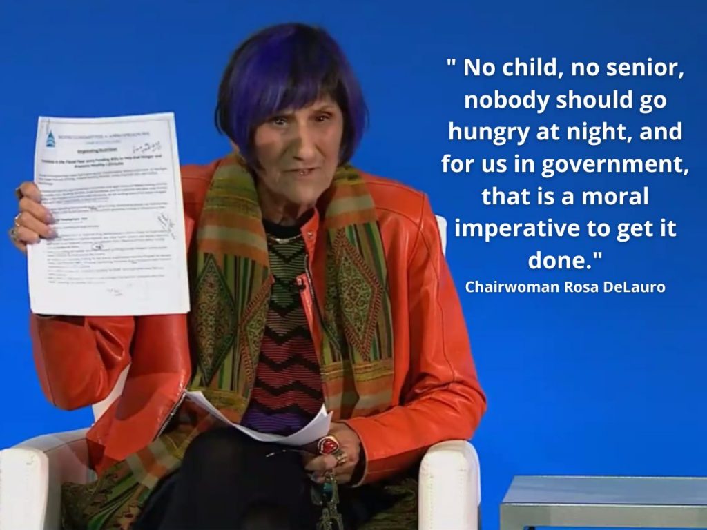 Rosa DeLauro holds up a piece of paper while speaking at White House Conference on Hunger, Nutrition and Health