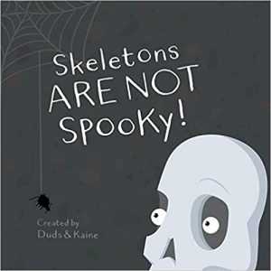 Cover of book Skeletons Are Not Spooky to read to CACFP participants. Book cover is black with white letters and a cute skeleton face.