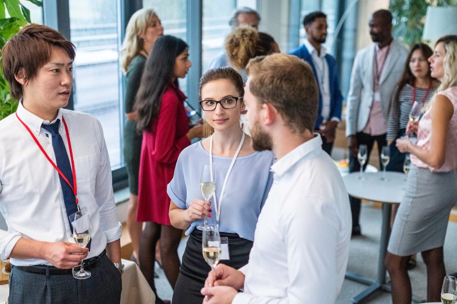 people dressed up business casual networking