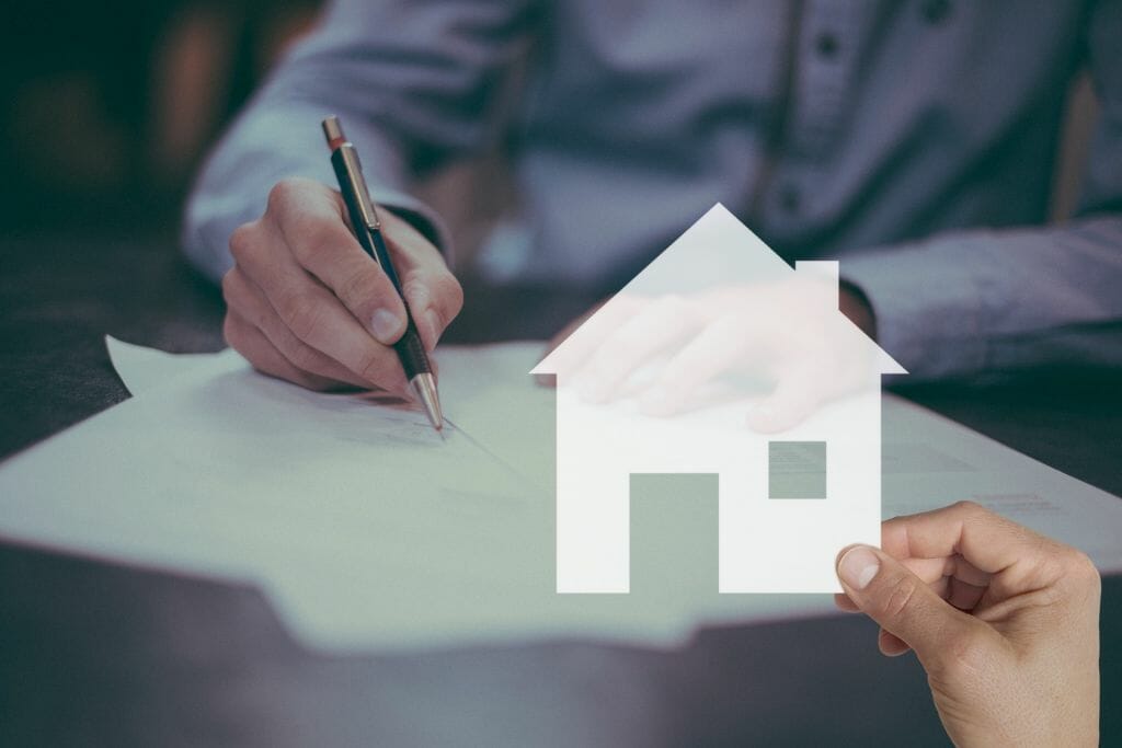 mortgage-5266520_1920 person signing papers