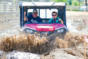 driving-in-mud-300 open air Honda splashing through mud