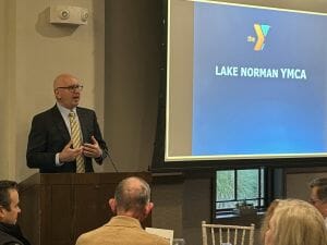 John Hettwer, Foundation Chair, shares why the Lake Norman YMCA Pre and After School programs was selected as the first recipient of funds at the annual “Thanksgiving Breakfast.”