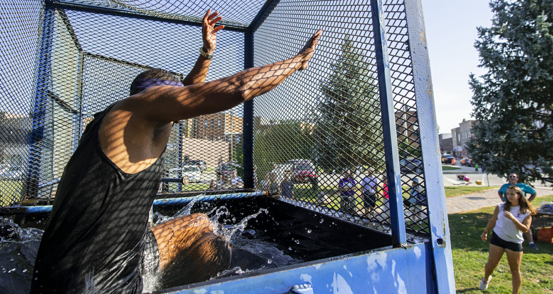 Coach Jeter getting dunked in the celebrity dunk tank