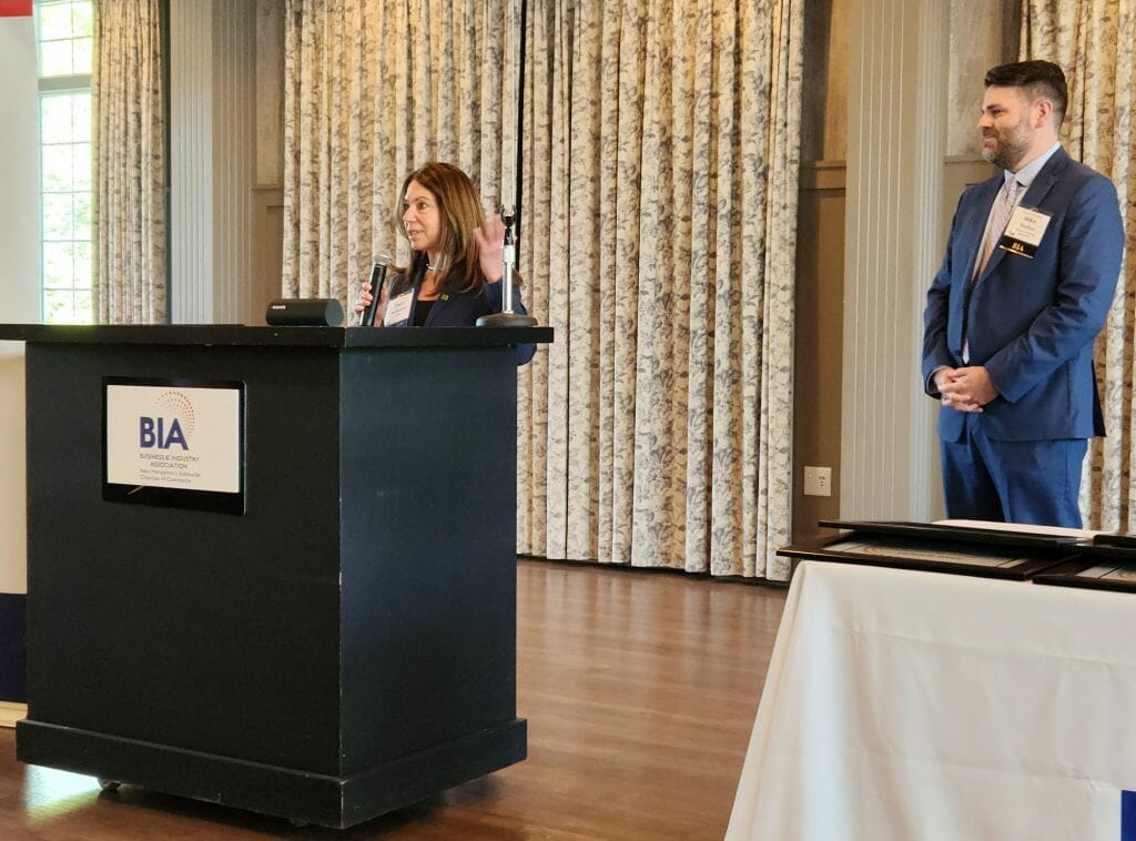 Sheryl McQuade, New England regional president of TD Bank, and past-chair of the Business &amp; Industry Association, delivers sponsor remarks during BIA’s Annual Business Meeting at LaBelle Winery in Derry Wednesday, May 17. BIA President and CEO Michael Skelton is at right. (Courtesy photo)