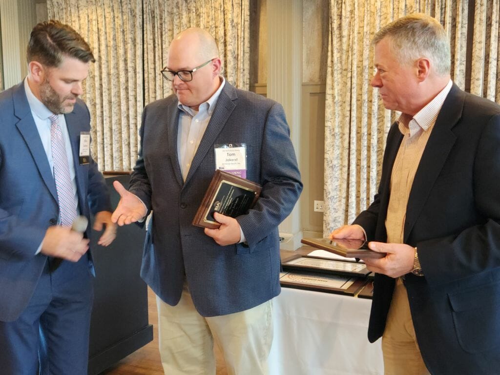 The Business &amp; Industry Association honored two of its outgoing board members at its Annual Business Meeting at LaBelle Winery in Derry Wednesday, May 17. BIA President Michael Skelton, left, thanks outgoing Chair Tom Jokerst, center, general manager of the Anheuser-Busch brewery in Williamsburg, Virginia, and former general manager of AB’s brewery in Merrimack; and Thomas Sullivan, right, senior vice president of operations, Sturm, Ruger and Company. (Courtesy photo)