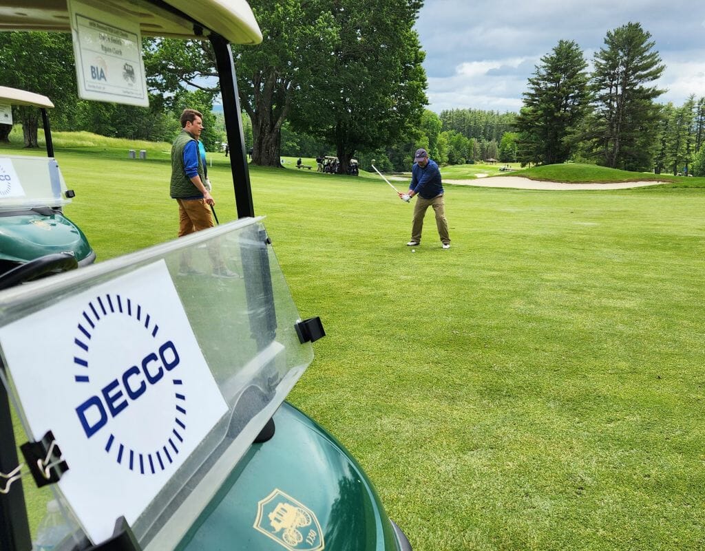 Owen Smith, president for Maine, New Hampshire and Vermont for AT&amp;T Services, looks to hit the green at Concord Country Club during the 28th annual BIA Golf Classic, presented by Comcast.