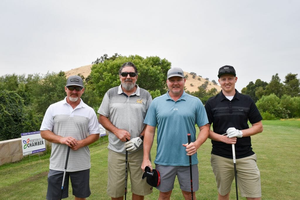 team of 4 at a Golf tournament