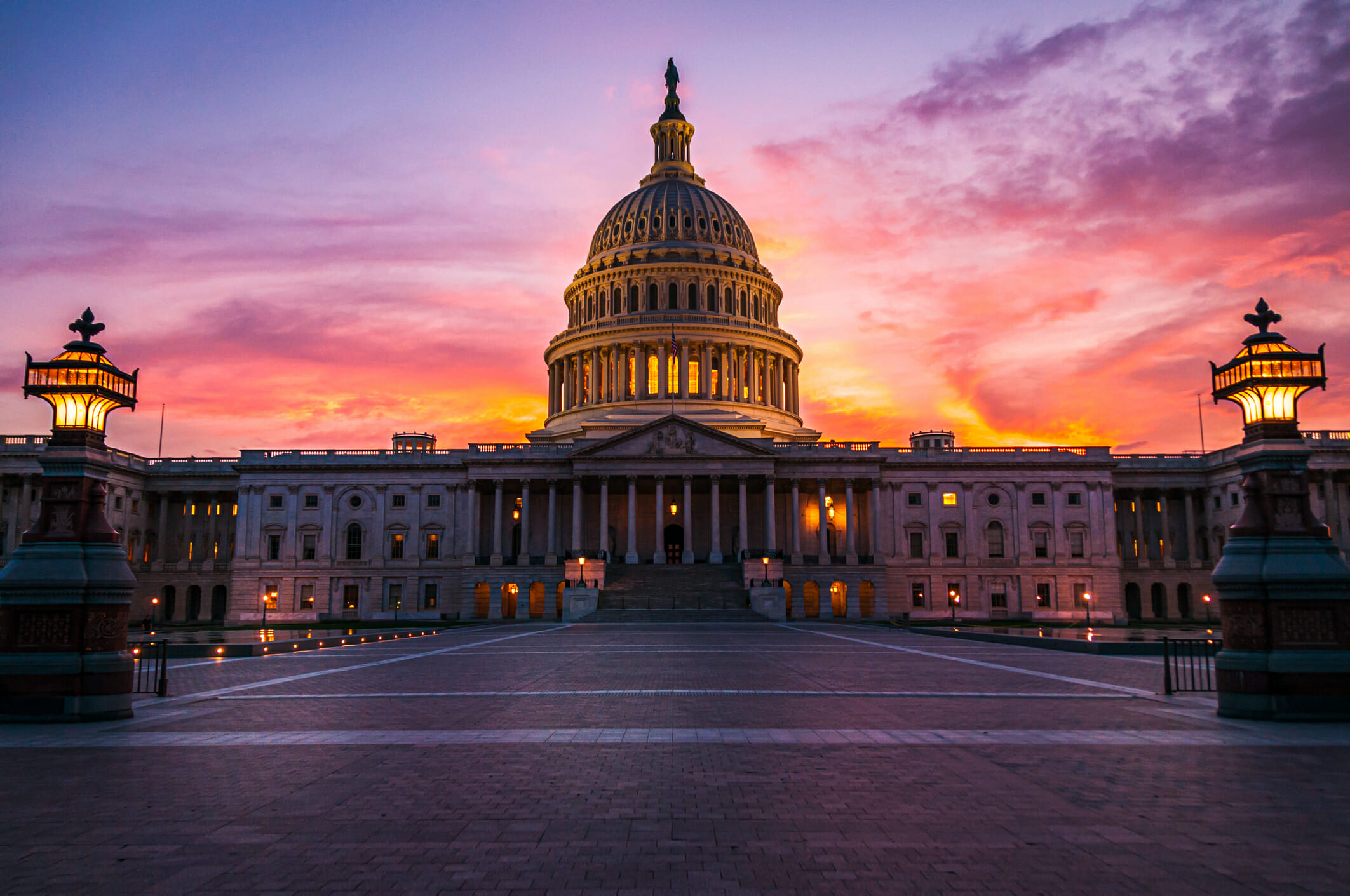 The capital dome illuminated after dark in Washington DC.