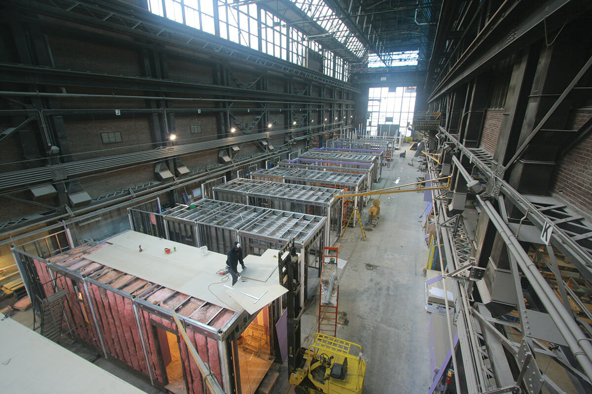volumetric modular construction takes place in a controlled factory setting