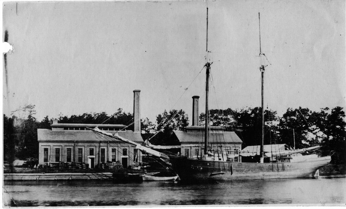 Schooner in front of Arsenal Gas Plant on the Charles River 1875
