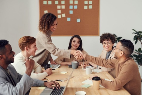 colleagues-shaking-each-other-s-hands