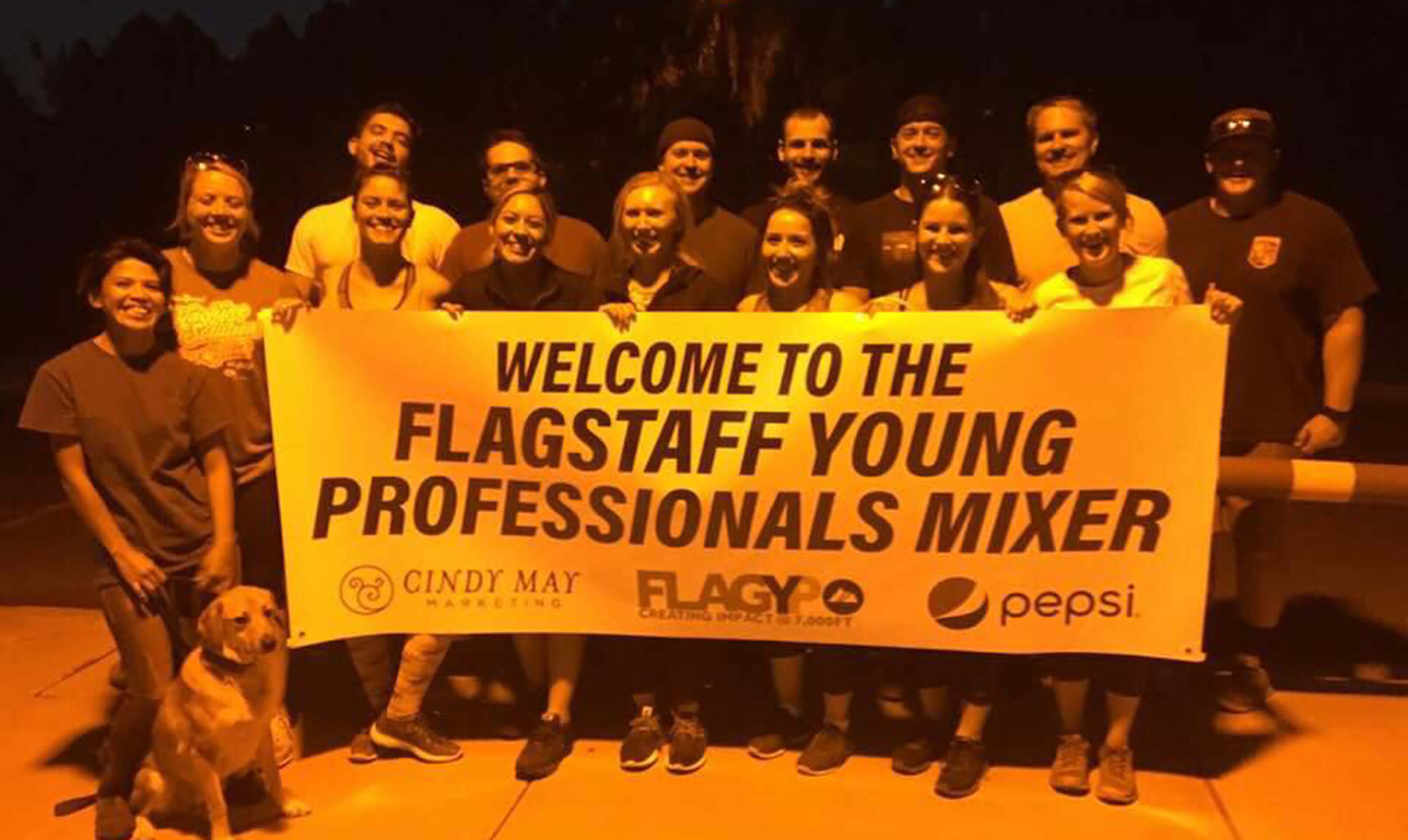 FYP mixer group photo with sign