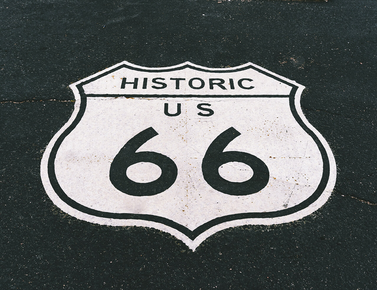 Historic Route 66 sign on the ground