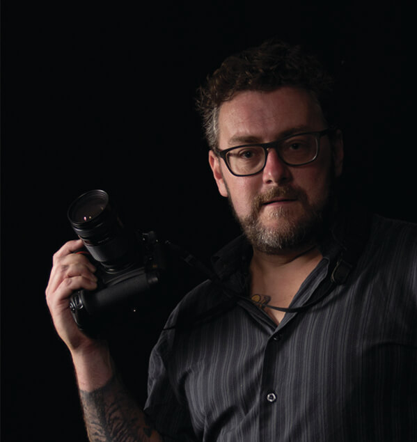 Tim photo with camera - Tim Sexton