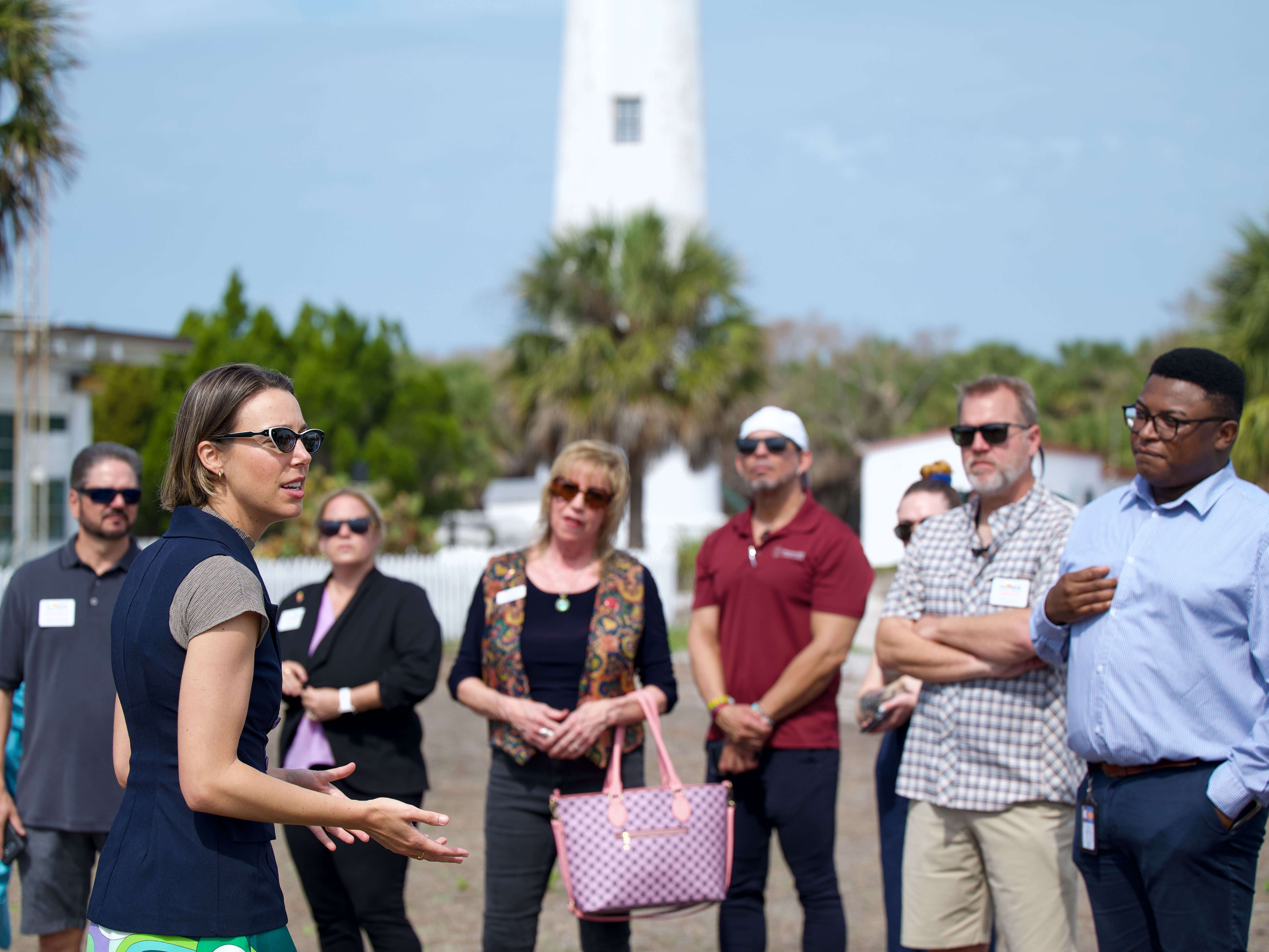 Tara Hubbard giving a tour to The St. Pete Chamber and our members during their ribbon cutting.