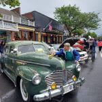 vintage green car at car show