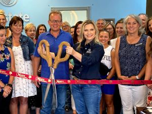 Investing in Business through Ribbon Cuttings