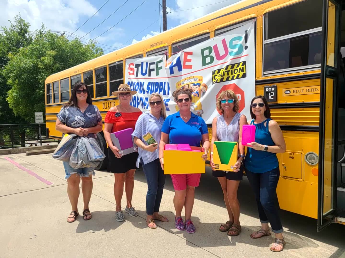 Some of our members in front of a school bus in Decatur, TX