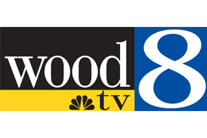 wood tv 8 logo