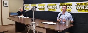 Congressman Fred Upton and State Representative Jon Hoadley during a live debate at WKZO