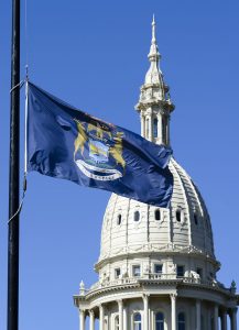 captiol with mi flag