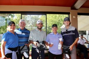 team at putt pass and chip event