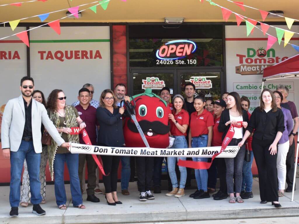 ribbon cutting for don tomate