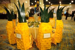 pineapple decorated table at chairman's ball