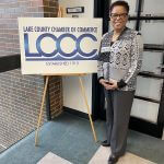 woman in front of lccc sign