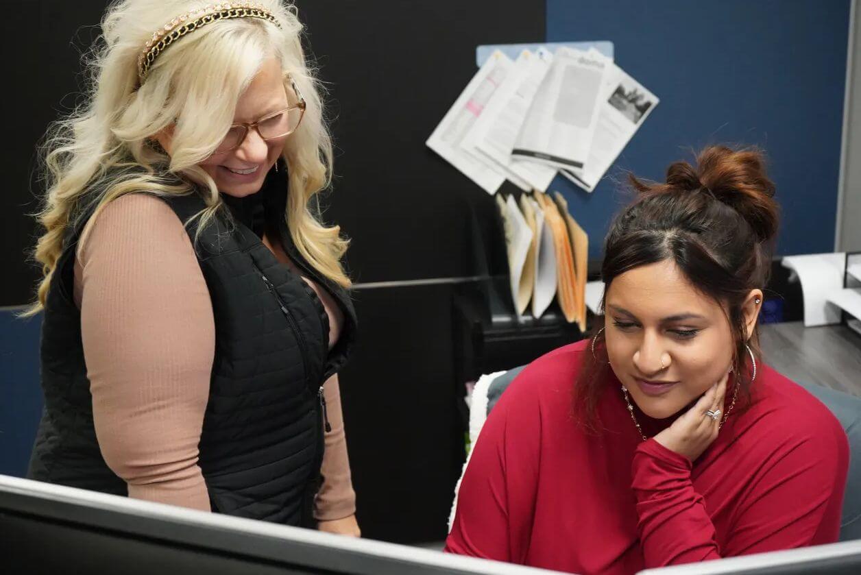 2 women looking at a computer screen