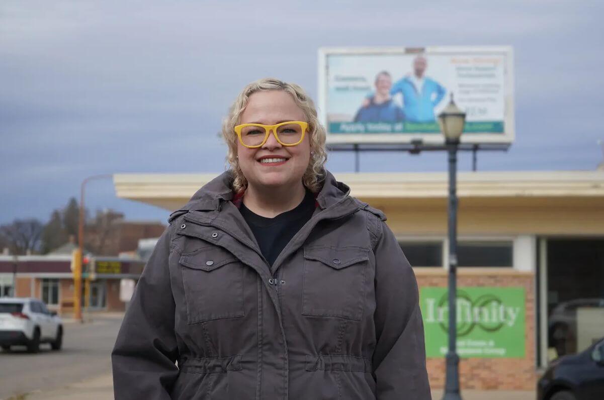 woman wearing yellow glasses