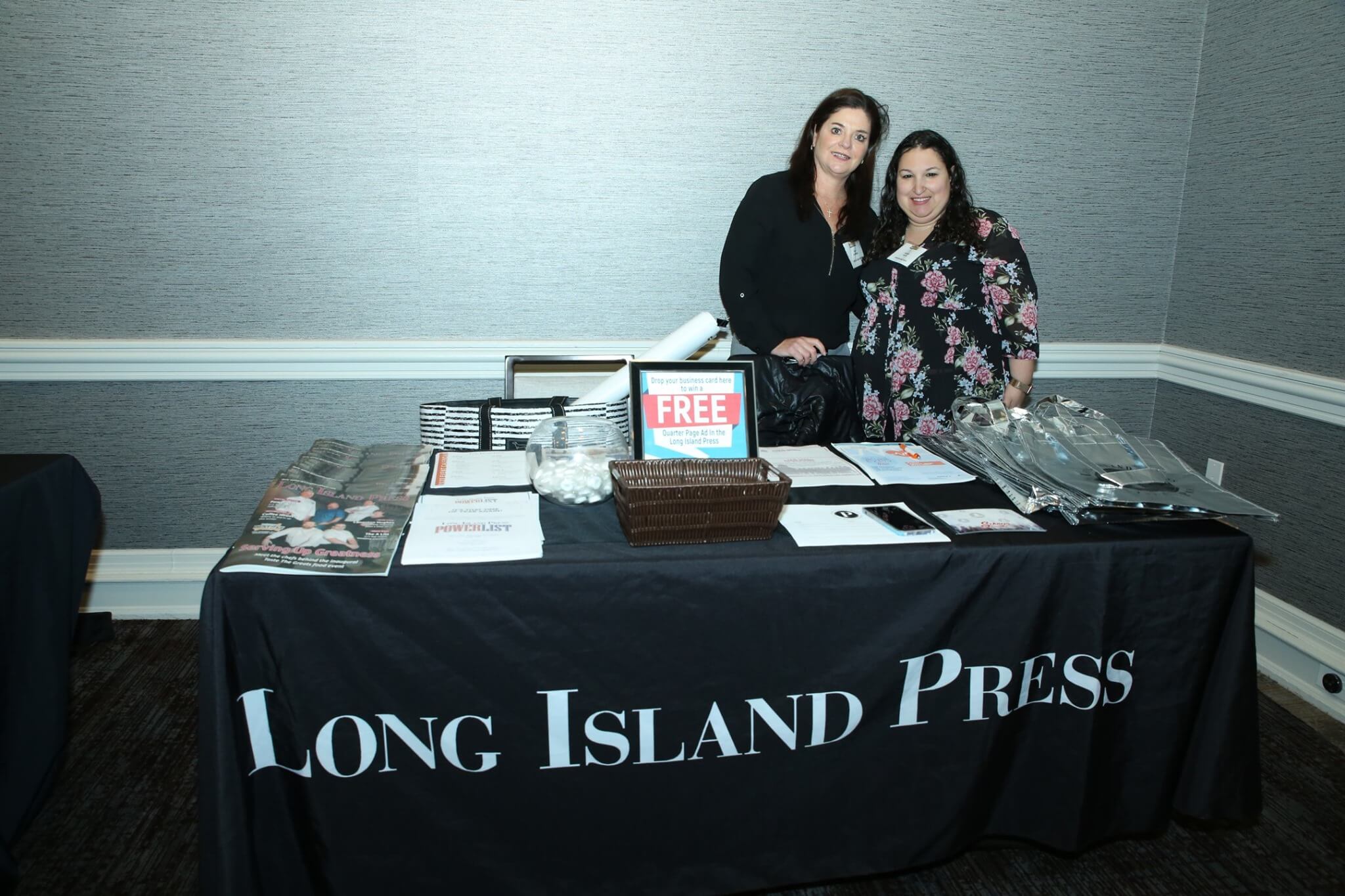 2 people at long island press table