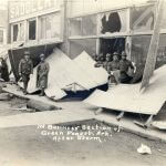 historic photo of a business after a tornado