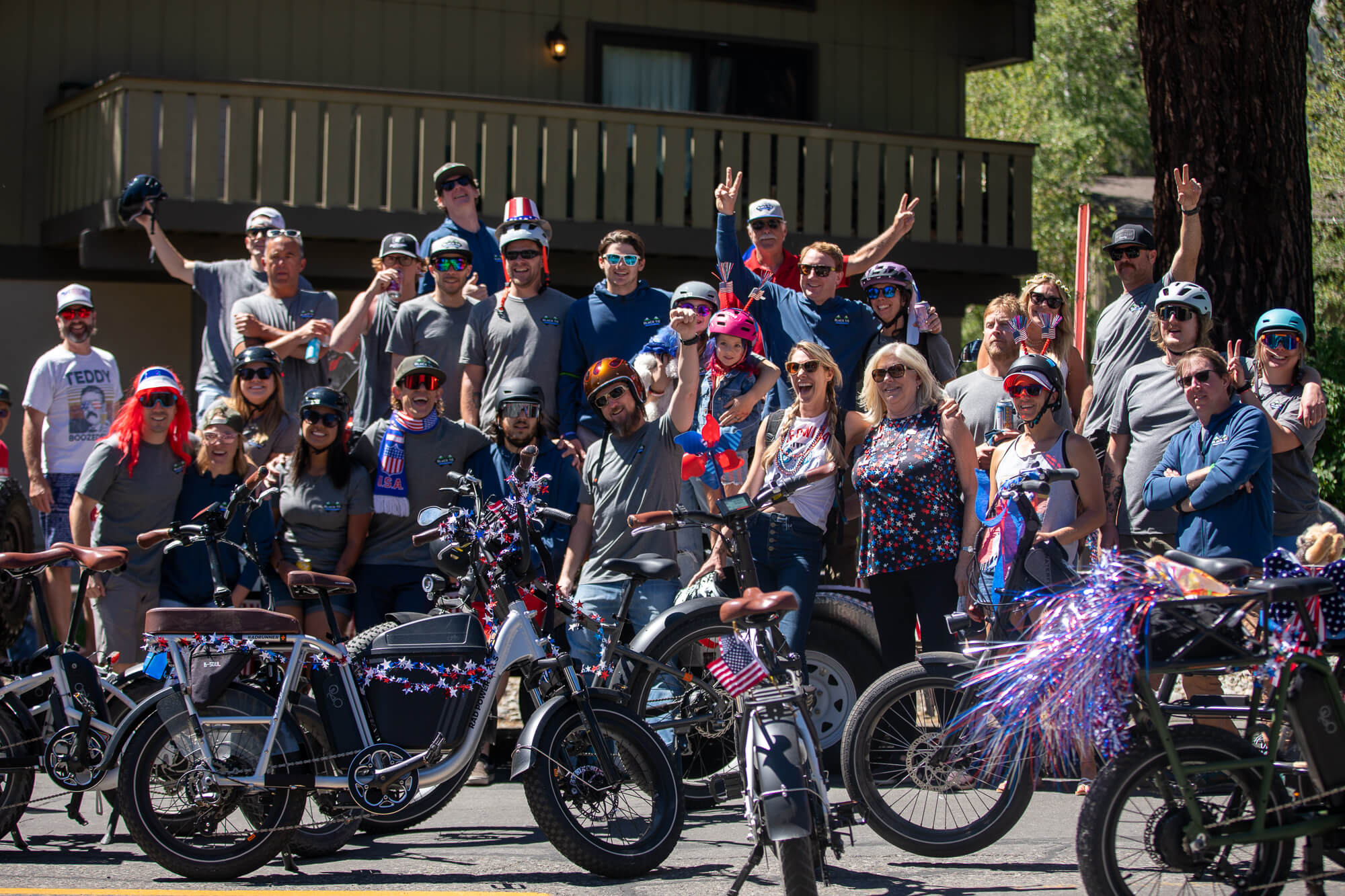 Black Tie Skis staff pose for a photo before the 4th of July parade