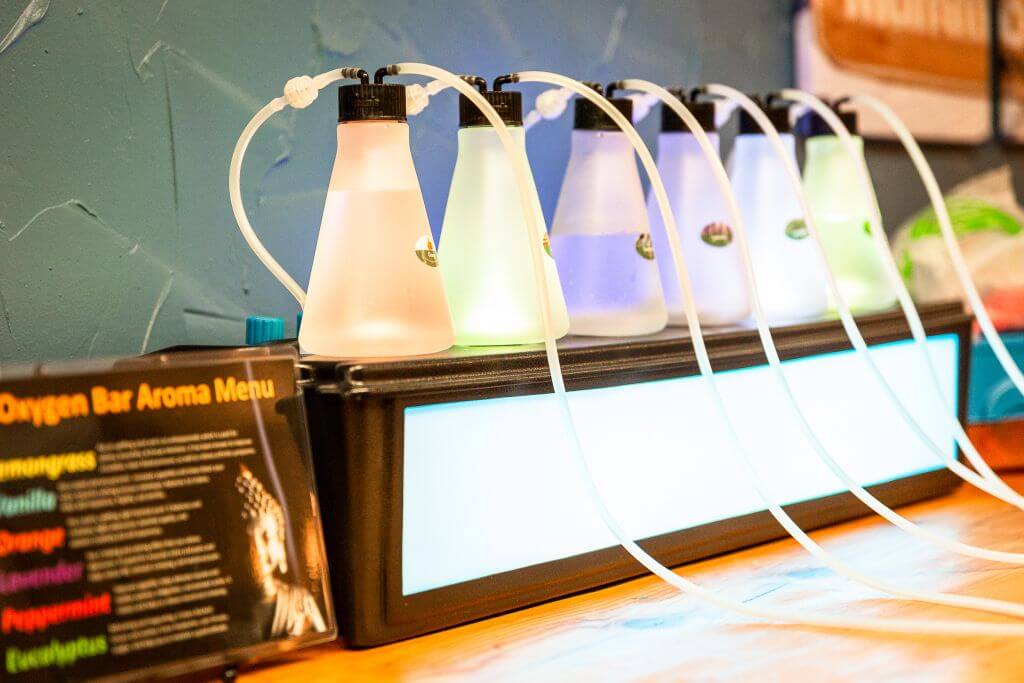 Peak IV Therapy and Hydration's oxygen bar aroma menu - multicolored bottles in a line