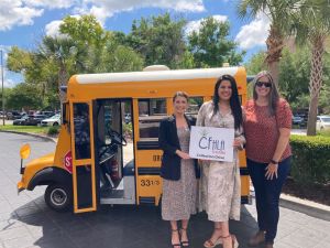 Cares Drive - 3 people with school bus
