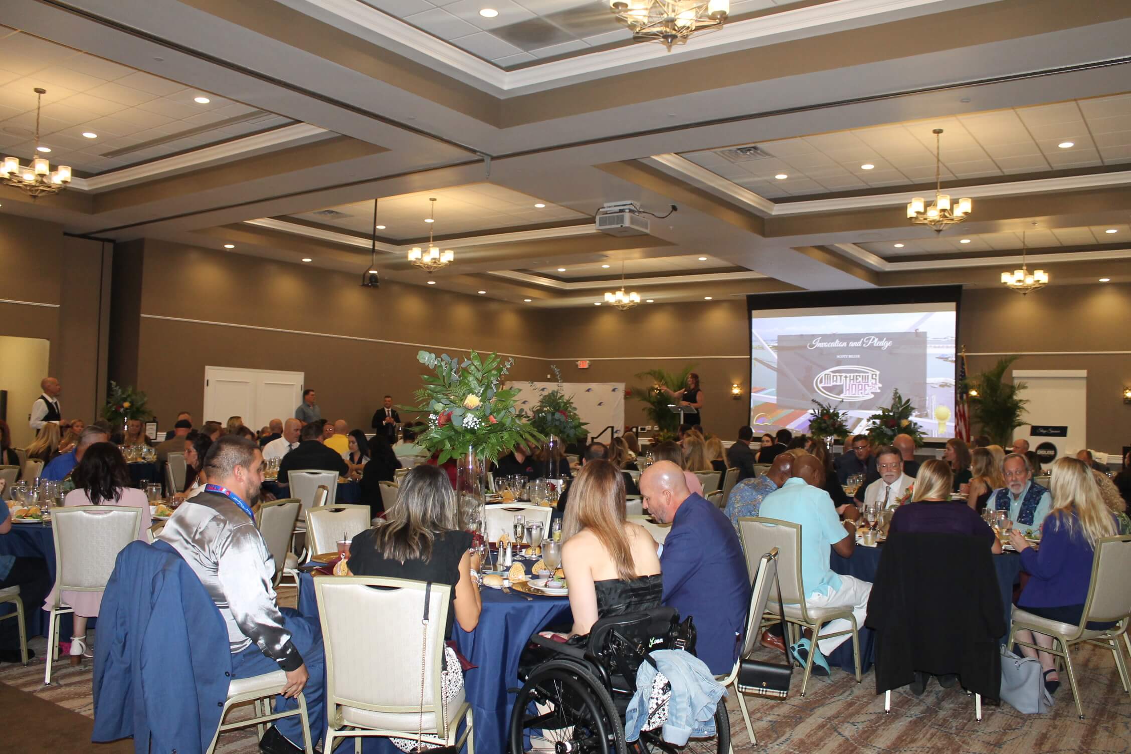 seated at tables at an event