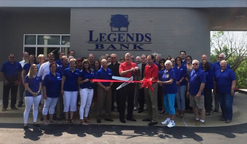 ribbon cutting ceremony in front of Legends Bank 
