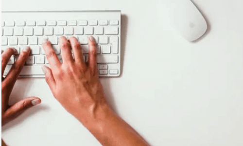 hands typing on a kayboard
