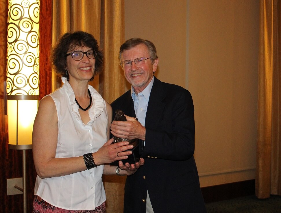 Nancy_Riestenberg_receives_the_John_Byrd_Award_for_Education_and_Teaching_from_Pres._Mark_Umbreit