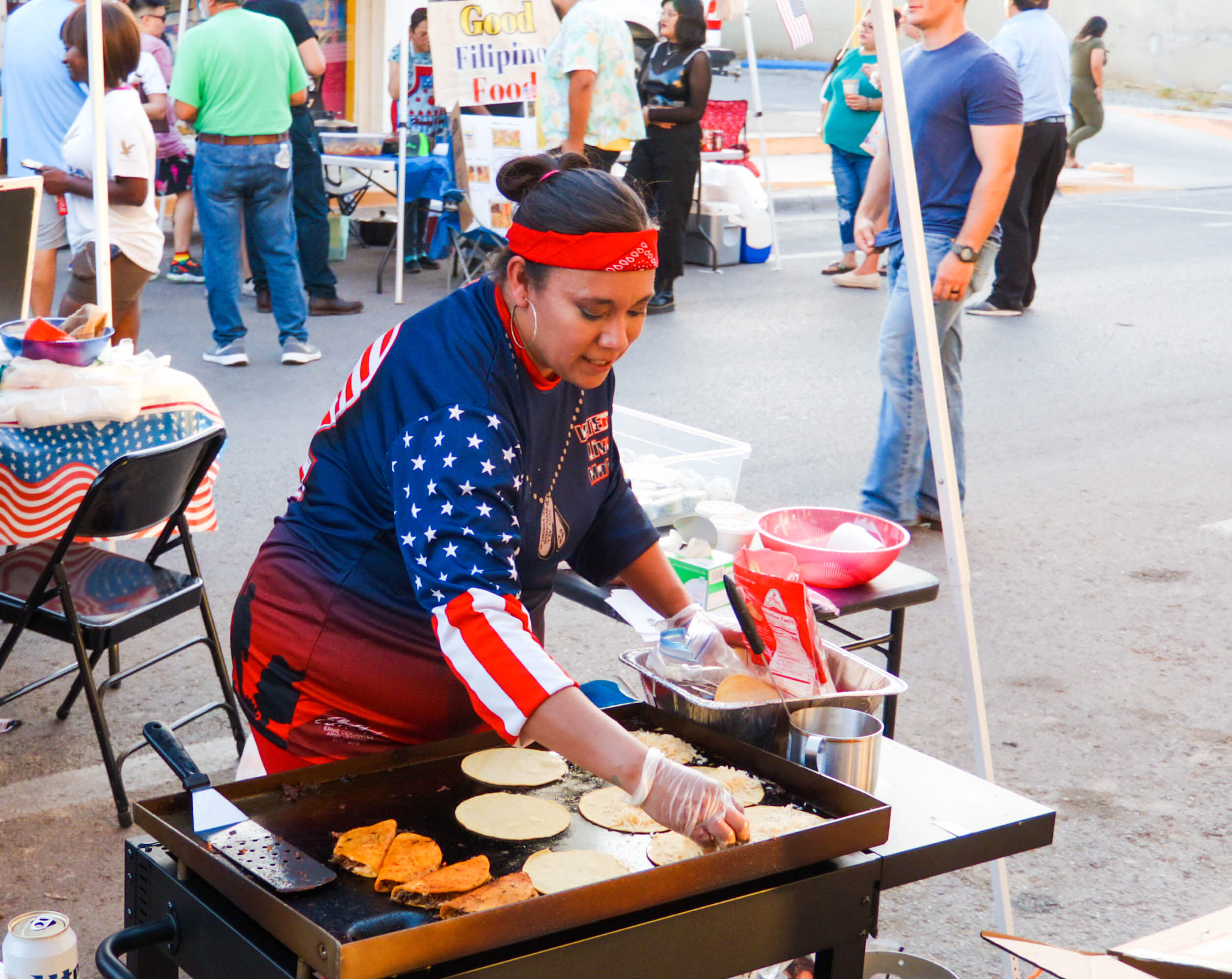 Woman Cooking at 4th of July Celebration