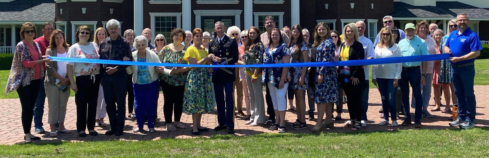 colonels castle ribbon cutting cropped