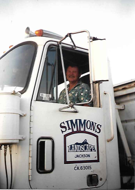 Simmons in one of the iconic Simmons Landscaping Trucks