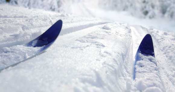 skier going down snowy slope