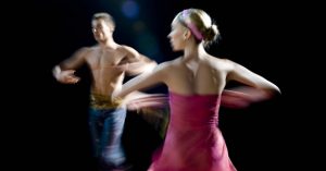 "Ballet dancers, side lighting with motion blur"