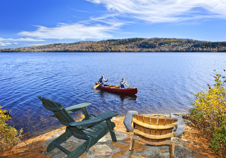 canoeing on lake in fall