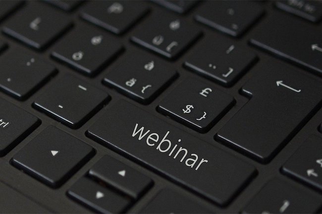 Leadership-Conducting Webinars - Keyboard with the word webinar on a key