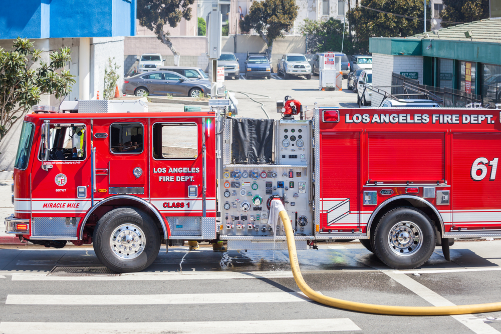Los Angeles firemen at work Los Angeles, California - Jul 29, 2017: Los Angeles fire truck in use
