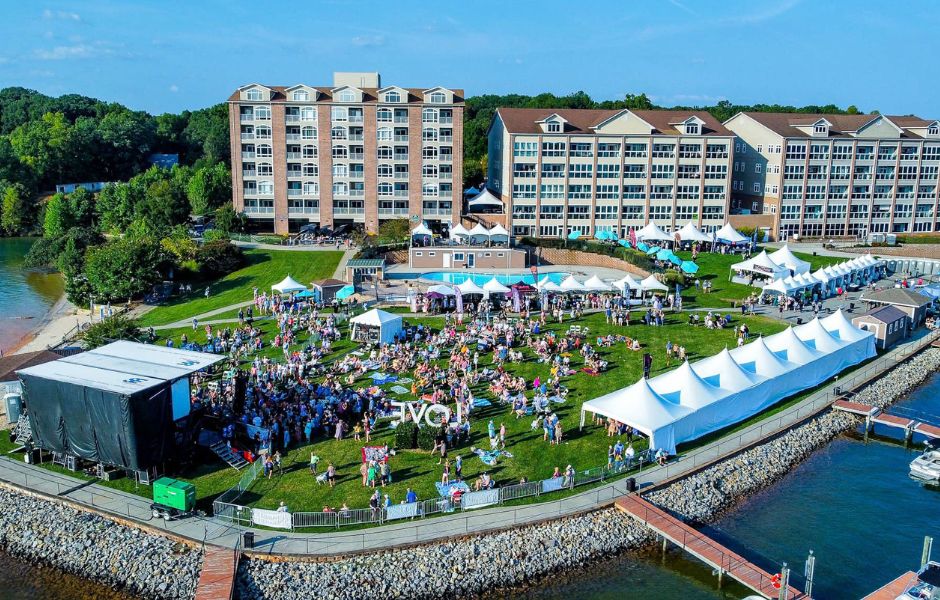 Hundreds of people on the lawn a the SML Wine Festival at Mariners Landing in 2022