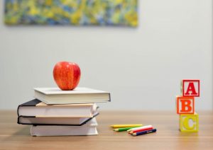 NC Governor Roy Cooper Extends Phase 2 | School books, picture courtesy Element 5 on Unsplash